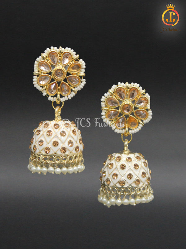 Elegant Kundan Jhumka Earrings With stones and imitation pearls.