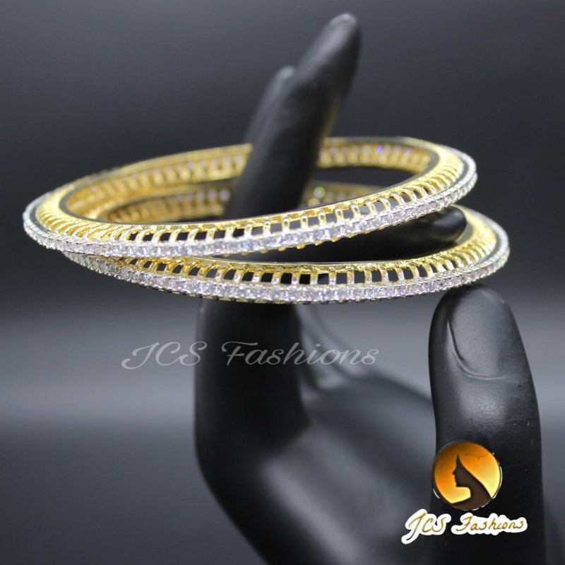 White stone bangles in gold polish