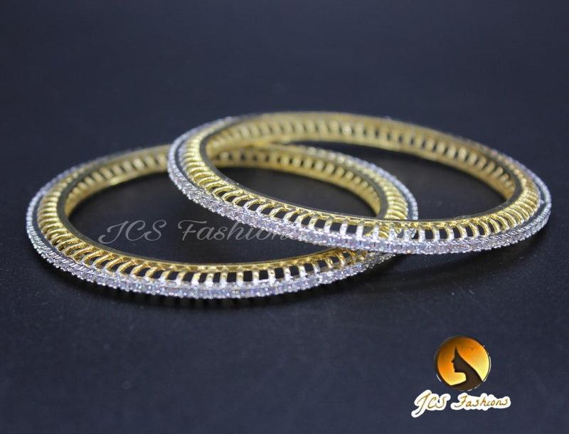 White stone bangles in gold polish